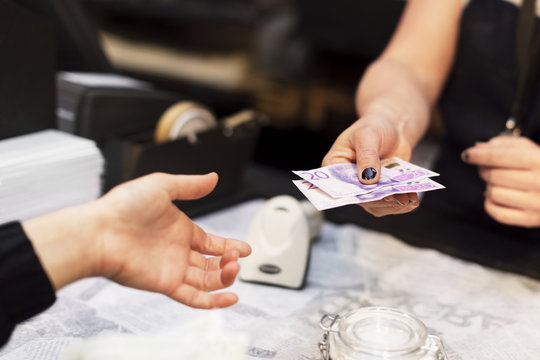 Woman pays at checkout