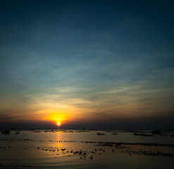 Beautiful Sunset Sunrise Sky over tropical sea landscape, vintage filter.