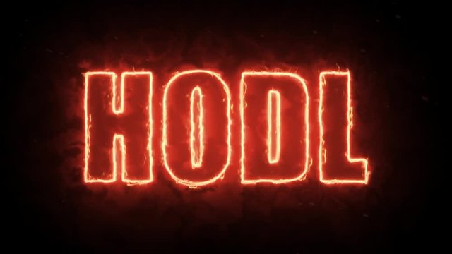 Hodl text word from hot burning letters on dark background