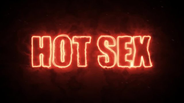 Hot sex text word from hot burning letters on dark background