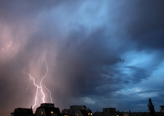 Thunderstorm lights. Bright lightning thunderstorms sparkle from the cloud. Dangerous electrical flash. Levin or scintillation for weather concept. Storm weather with heavy rain. Lightning bolt strike - Powered by Adobe