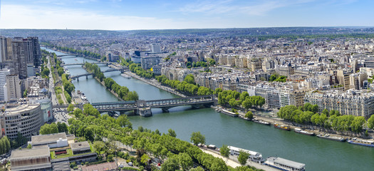 Aerial panoramic view of Paris cityscape with Seine river, Bir Hakeim bridge, island of Swans