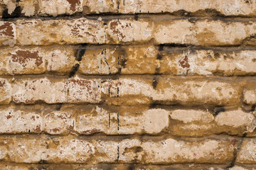 Grunge dirty old brick stone wall.