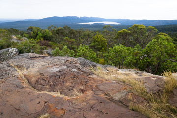 View into the valley and to a lake at Reeds Lookout, Grampians, Victoria, Australia