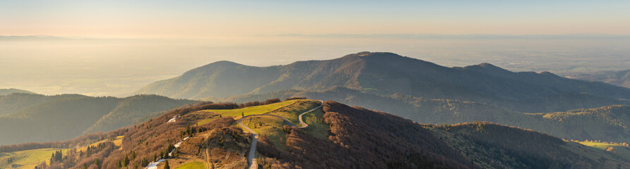 French landscape - Vosges. View from the Grand Ballon in the Vosges (France) towards the Jura and Alps in the early morning. - Powered by Adobe