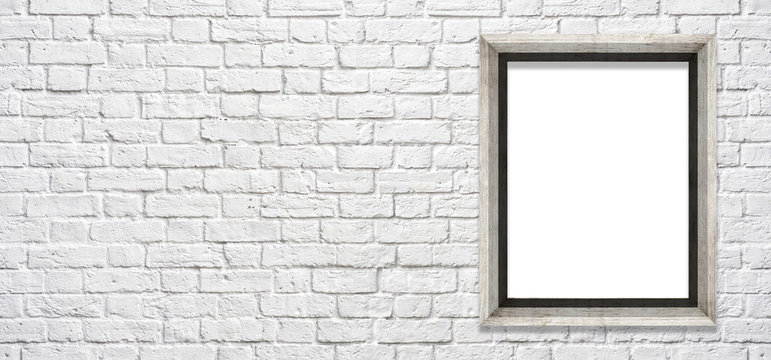 white brick wall with a frame to insert pictures and text
