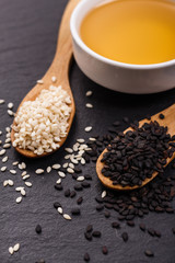 fresh sesame seeds on a rustic background