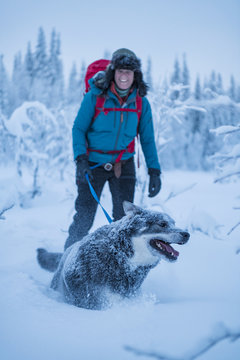 Woman with dog at winter