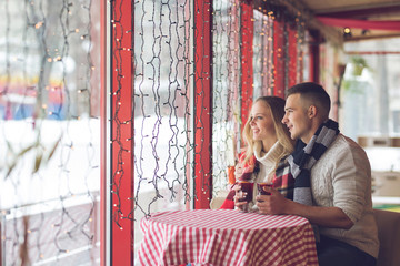 Smiling couple in a cafe