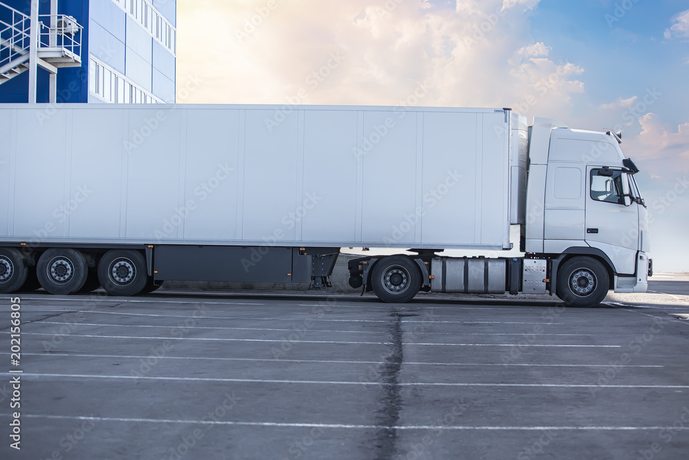 Poster truck is loaded at a large warehouse