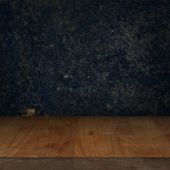 Wooden kitchen top table with dark stone background