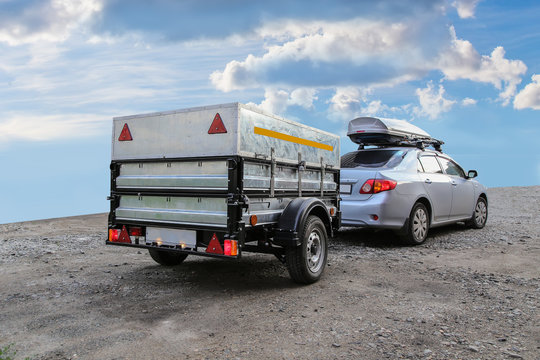 car with trailer road