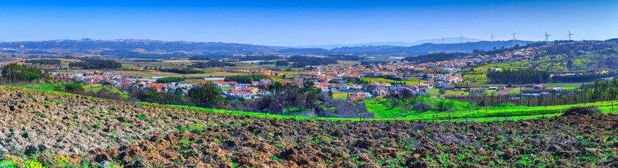 A typical agricultural landscape of springtime somewhere in Oeste near Obidos, civil parish Olho Marinho, district of Leiria in Portugal.