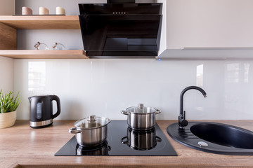Black sink and induction hob