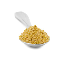 Coriander Powder or Dhaniya Powder in Spoon isolated on White Background