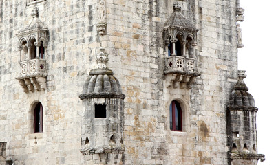 Fototapeta premium Medieval gray stone wall with balconies and windows