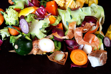 leftovers of freshly cut carrots, onions, zuccini and broccoli