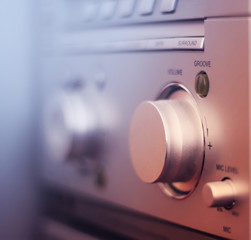 old vintage music hi-fi amplifier close up with volume knob
