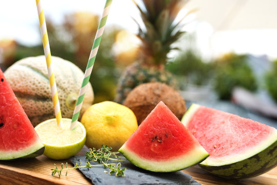 Exotic summer fruits on a wooden table