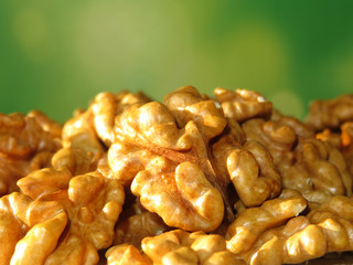 Walnuts on green natural background