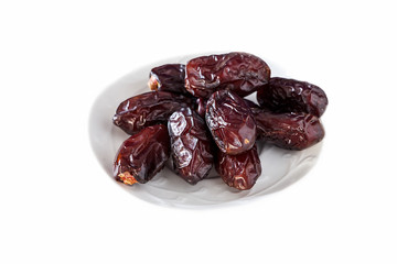 Isolated Organic Dates on white background. Close up.