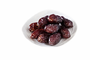 Isolated Organic Dates on white background. Close up.