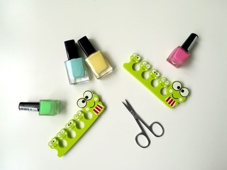 All for pedicure:  nail polishes, manicure scissors, finger separators