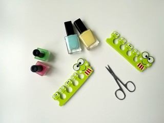 All for pedicure:  nail polishes, manicure scissors, finger separators