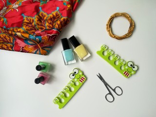 All for pedicure:  nail polishes, manicure scissors, finger separators