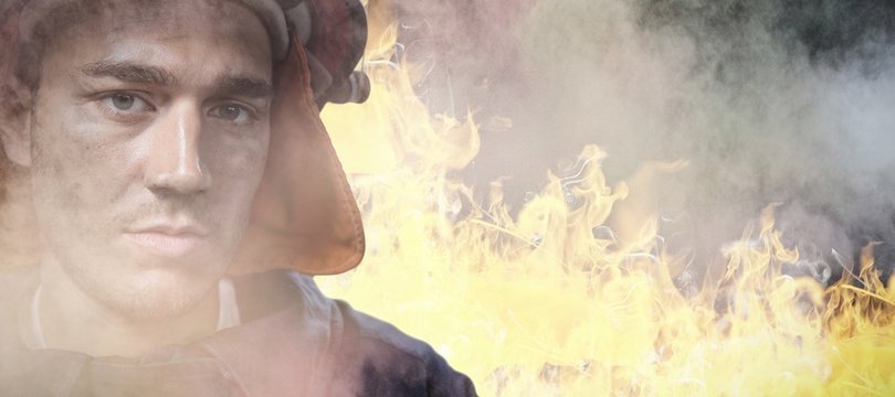 Composite image of serious fireman