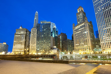 Fototapeta na wymiar Buildings on Wacker Drive on the shore of Chicago River, Chicago, Illinois, USA
