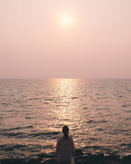 People silhouette sunset and seascape.