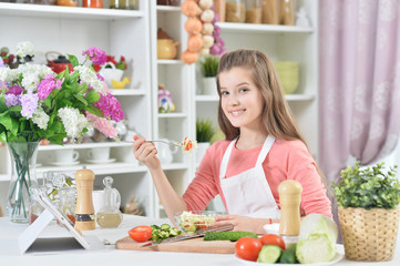 attractive young girl cooking 