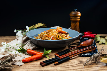 wok fried chicken stir fry with sweet peppers and chinese vegetables