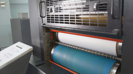 Professional printing machine working in the typography