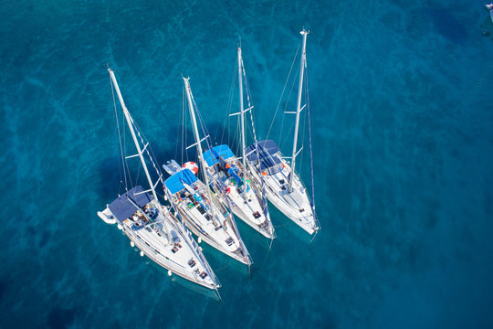 Fototapeta amazing view to yacht group and clear water - caribbean paradise