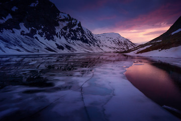 Norway Glacier lake after sunset - drone photo, ice in foreground