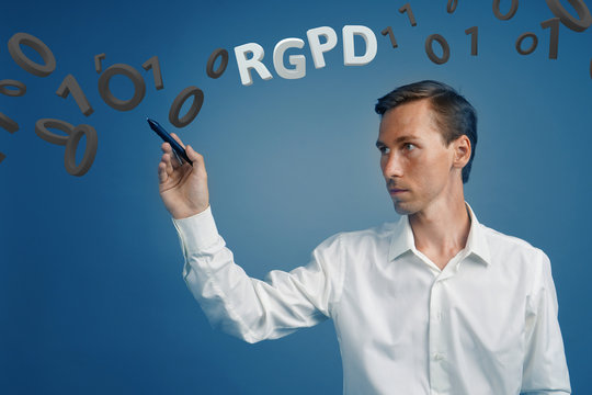 RGPD, Spanish, French and Italian version version of GDPR: Reglamento General de Proteccion de datos. General Data Protection Regulation. Young man working with information.