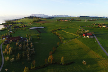 Aerial view of the Prealps in Switzerland on a spring morning with Mount Pilatus in the background