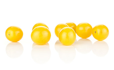 Yellow grape cherry tomatoes isolated on white background group of eight.