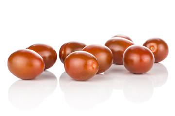 Black red grape cherry tomatoes isolated on white background ripe.