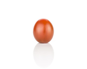 One black red grape cherry tomato isolated on white background whole and oblong.