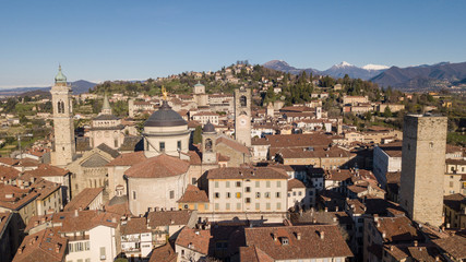 Fototapeta na wymiar Drone aerial view of Bergamo - Old city. One of the beautiful city in Italy. Landscape on the city center, its historical buildings and towers