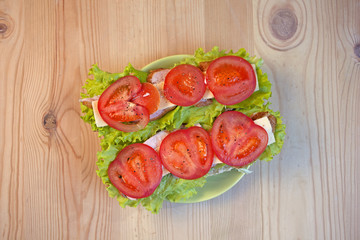 Homemade tasty sandwich with meat and vegetables