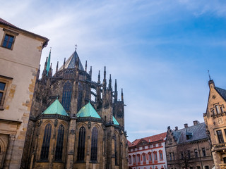 PRAGUE, CZECH REPUBLIC - FEBUARY 19, 2018 : St. Vitus cathedral in Prague Castle front view of the main entrance in Prague, Czech Republic.Blue sky sunny background winter season.Landmark historical
