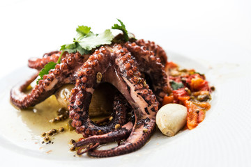 Mediterranean Octopus with vegetables and potatoes