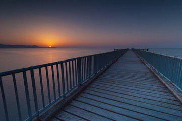 Obraz na płótnie Canvas The Sunset over the Pier