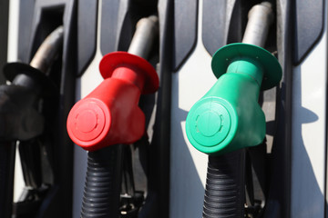 Fuel pistols close up at the gas station