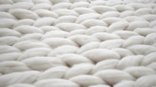 White texture background from merino knitted blanket