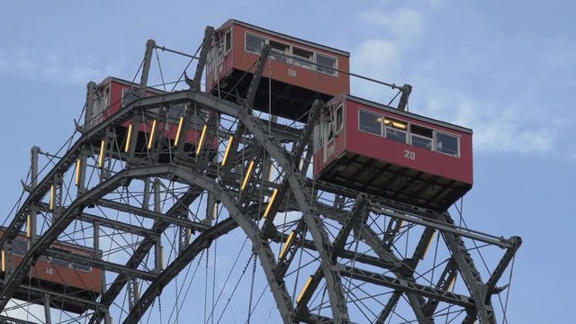 Giant Ferris Wheel with red cabins